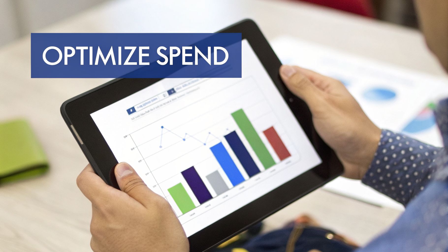A person holds a tablet displaying a data analysis graph. A banner reads 'OPTIMIZE SPEND'.