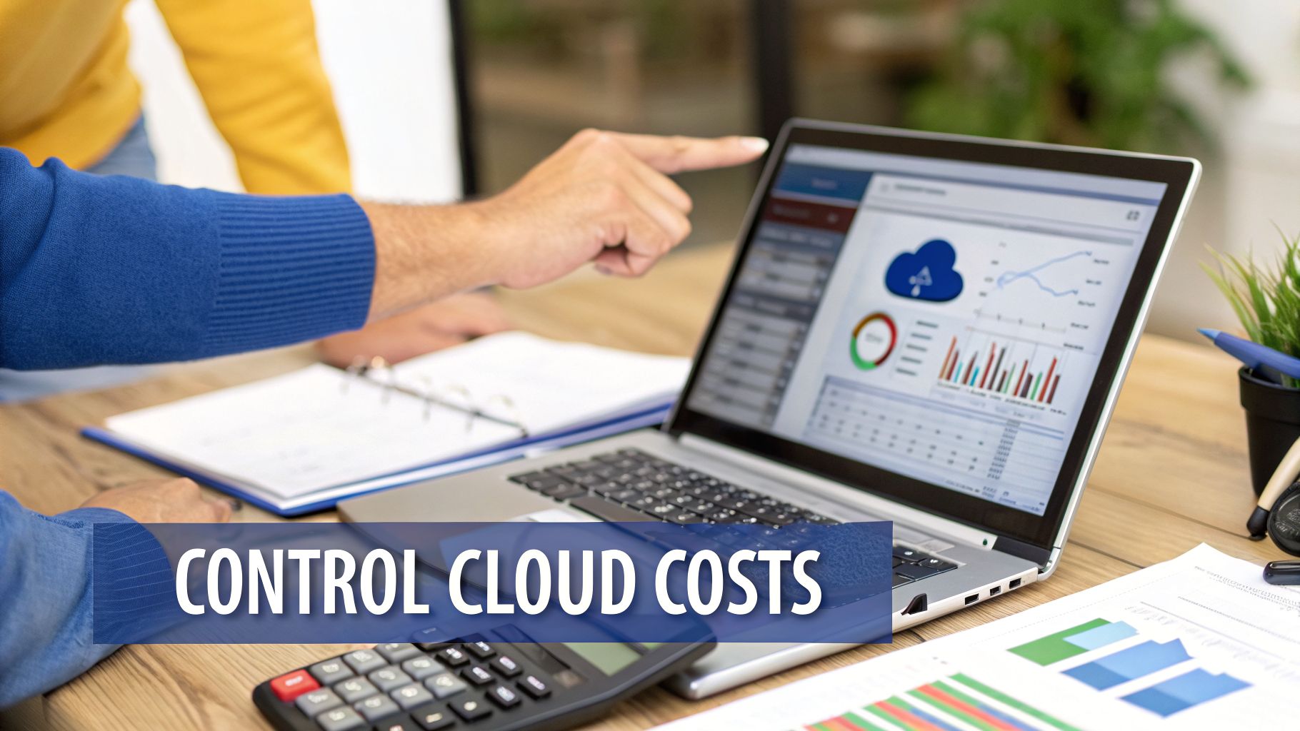 Two people analyzing cloud cost reports on a laptop with charts and a calculator on a desk.
